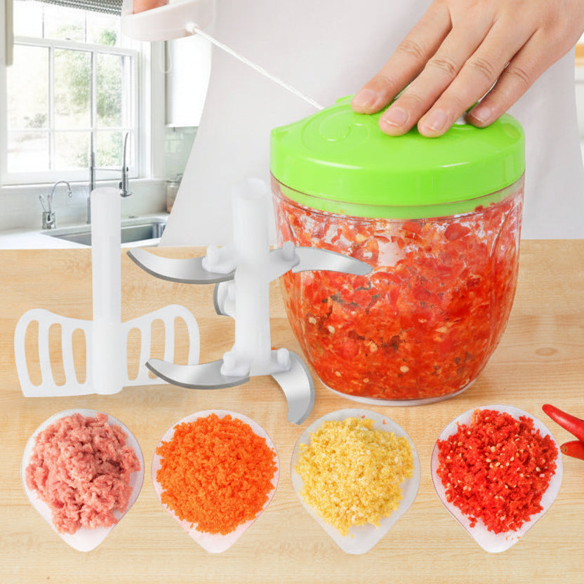 Handheld food chopper with food processing results on a wooden surface