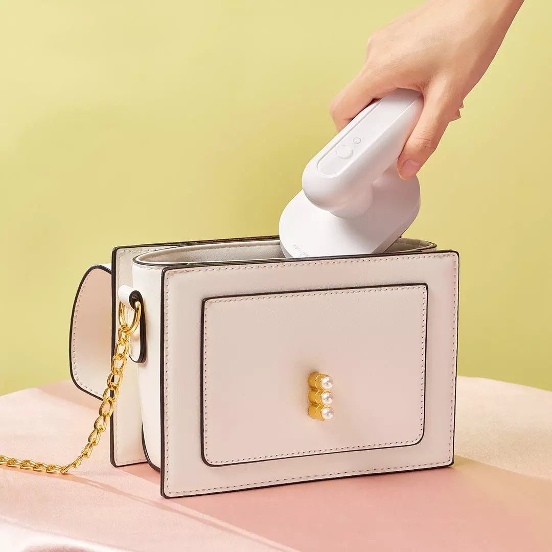 Wireless portable electric travel ironing machine
